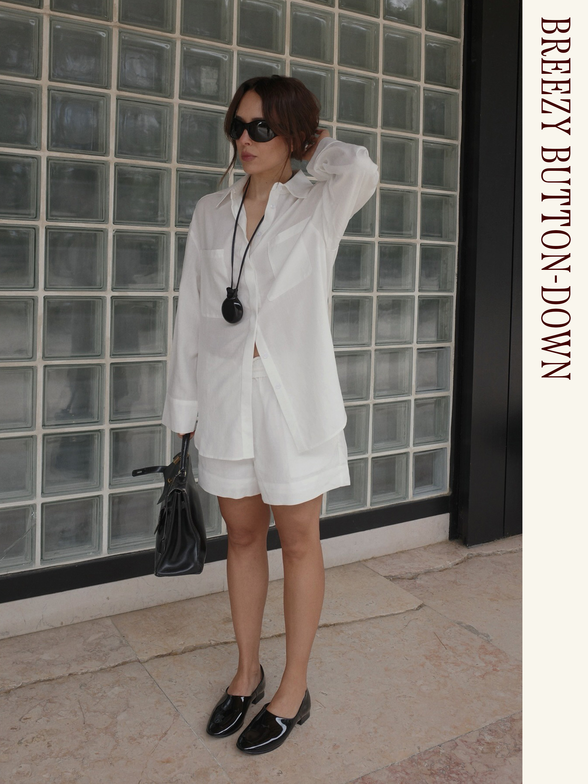 Influencer wearing a white button-down and shorts with patent leather shoes.
