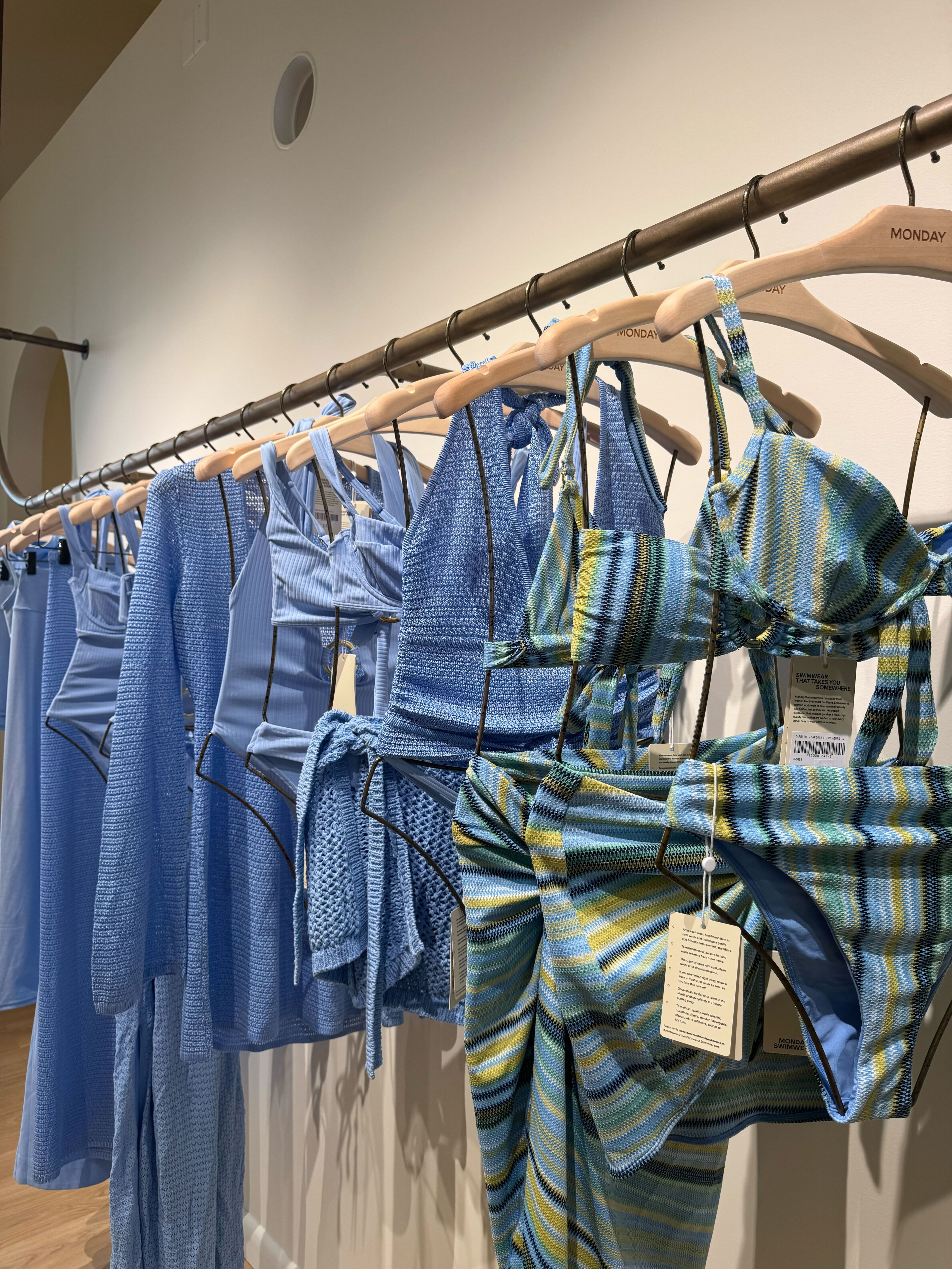 dcfcnpxwgkwsrzqss3wjse a picture of swimwear inside the monday swimwear nyc store.
