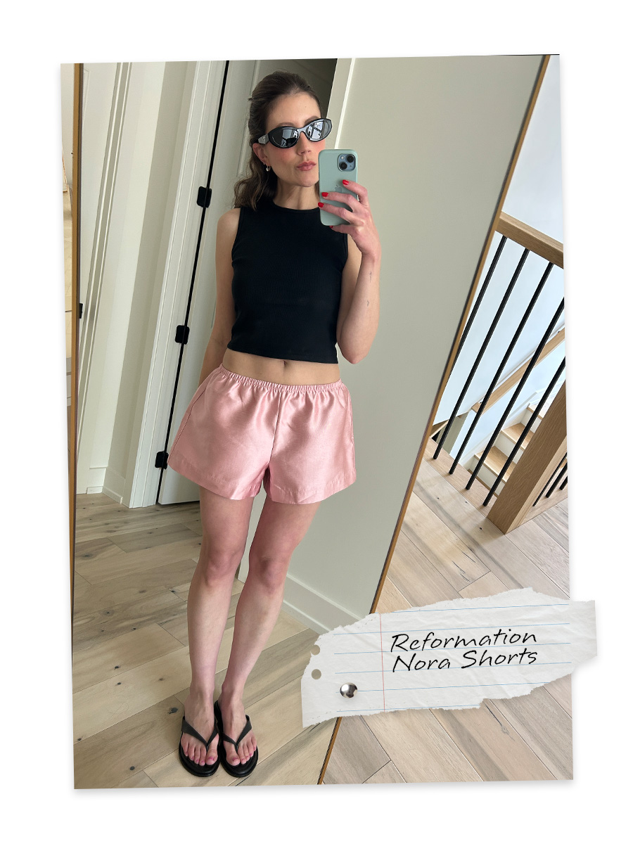 pav3h27usajytmjc3rbyts Allyson Payer trying on Reformation Nora Shorts.