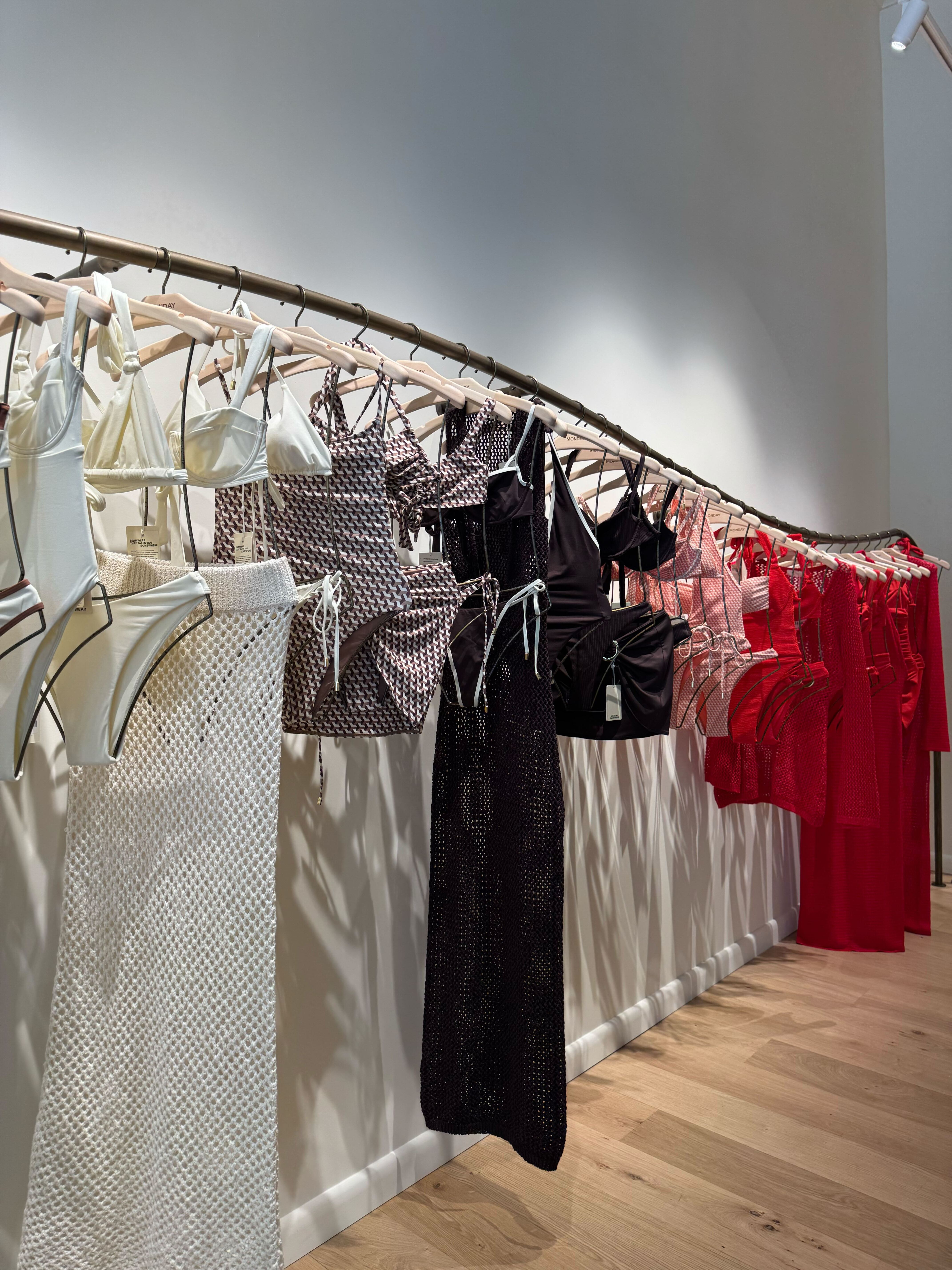 vukwnau4fe7sgwhxrdmxye a picture of swimwear inside the monday swimwear nyc store.